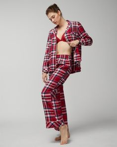 Getting dressed up (or down) for the holidays is always special and pajamas are no exception! Bring on the holiday cheer with these super soft flannel pajama pants that are perfect for enjoying all your favorite seasonal activities. Enjoy the side pockets for housing your essentials and the effortless stretchy waistband for ultimate comfort. The classic cut is a great go-to and the velour piping adds an extra festive touch, setting it apart from the rest of your pajama wardrobe. Details Pull-on Pajama Wardrobe, Seasonal Activities, Night Pajama, Sleep Clothes, Flannel Pajama Pants, Soma Intimates, The Vanishing, Getting Dressed, Bra Shop