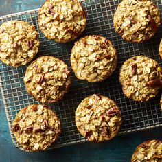 muffins with oats and cranberries on a cooling rack, ready to be eaten