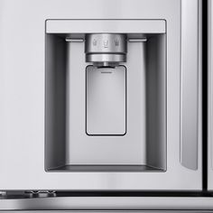 a stainless steel refrigerator with water dispenser and ice maker on the door