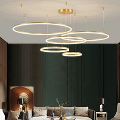 a modern living room with circular lights hanging from the ceiling