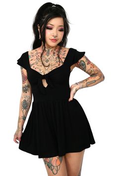 This all black romper features a tie front with small keyhole, and flattering flowing shorts. Smocked back for the perfect comfy fit. The tie front unties, but the keyhole is sewn shut, so the top does not open fully at the tie Gothic Summer Outfits, Samara Dress, Black Babydoll, Moon Dress, Cute Caps, Off Shoulder Romper, Romper Black, Flowy Shorts, S M