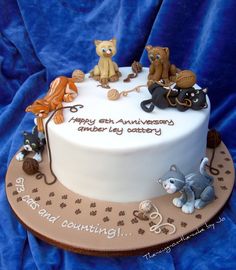 a birthday cake with animals on it