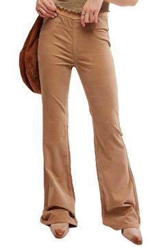 A stretchy pull-on waistband brings ultimate comfort to a pair of jeans cut from stretchy corduroy in a retro flare-leg silhouette. 34" inseam; 23" leg opening; 9 1/2" front rise; 13" back rise (size 29) Pull-on style Faux front scoop pockets; back patch pockets 98% cotton, 2% spandex Machine wash, tumble dry Imported Courdoury Flare Pants, Womens Corduroy Flare Pants, High Rise Brown Cotton Flare Jeans, Free People Corduroy Pants, Bdg Corduroy Pants, Corduroy Flare Pants, Summer Wardrobe Essentials, Swimming Outfit, Sports Blazer