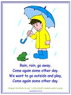 a child in yellow raincoat holding an umbrella and frog sitting on ground next to him