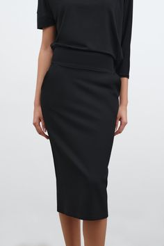 Meet sophistication. The Vesey Pencil Skirt is our modern update of a classic silhouette. She features a waist-flattering high rise and extra-wide waistband, plus two side pockets at the hips to create a sophisticated long black fitted skirt. Crafted from our beloved European ponte, Vesey is wrinkle-resistant with a crisp look and a touch of stretch, so you'll look polished in this tall pencil skirt until the end of the day—and into the night. [SPLIT] Astrid is 5'9" (175 cm) tall, wearing size X Black Long Lined Pencil Skirt, Modern Black Midi Pencil Skirt, Black Pencil Skirt Outfit Work, Black Non-stretch Long Skirt, Long Black Pencil Skirt, Wool Skirt Outfit, Winter Mini Skirts, Black Stretch Full-length Pencil Skirt, Black Sleek Midi-length Pencil Skirt