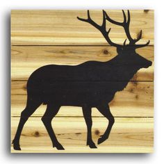 a wooden sign with a deer silhouette on it