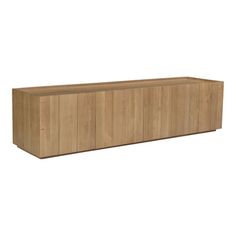 a large wooden cabinet sitting on top of a white wall