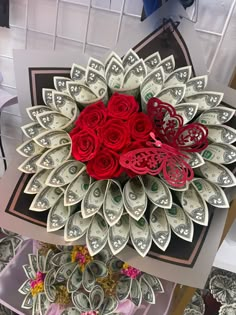 a bouquet of flowers made out of dollar bills