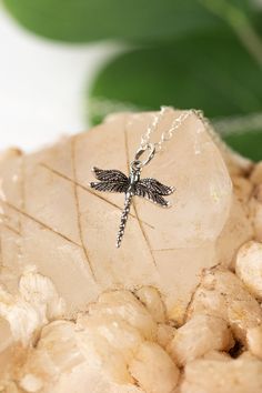 Celebrate transformations and new beginnings with this dainty dragonfly necklace. Handcrafted with a sterling silver chain and dragonfly focal, shorter in design resting at 15.25-17.25" with an adjustable lobster claw clasp. Sterling Silver (nickel and lead-safe) Sterling Silver Dragonfly 15.25-17.25", adjustable with sterling silver lobster claw clasp We hand select our natural materials, thus there may be slight variations in color and/or size that will not detract from the overall aesthetic O Floyd Va, Personalized Cross Necklace, Designer Handmade Jewellery, Dragonfly Necklace, Jewelry Ads, Gold Name Necklace, Custom Name Necklace, Delicate Jewelry