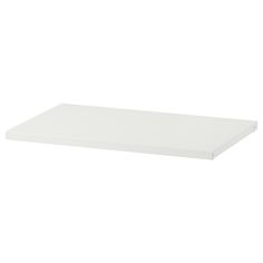 a white shelf that is on top of a wall and has no one in it