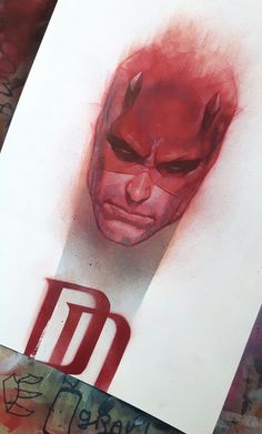 a drawing of a man's face with red paint on it and the letter d