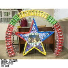 a star shaped decoration made out of plastic bottles