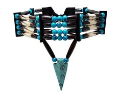 - Made from authentic buffalo bone hairpipe beads, genuine leather, and synthetic turquoise. - 12.5 inches long (without the leather ties). - Hand carved synthetic turquoise arrowhead pendant. - 4 strand traditional tribal bone choker. - 100% Handmade in the USA. We accept custom orders, just message us to discuss your ideas. Bone Choker, Arrowhead Pendant, Seed Bead Jewelry Patterns, Native Beading Patterns, Native American Necklace, Beautiful Beadwork, Native Jewelry, Native American Beading, Jewelry Fashion Trends