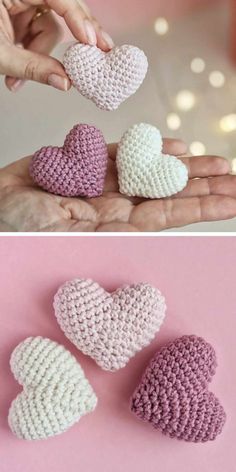 crocheted hearts are being held by two hands