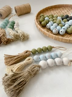 various beads and tassels laid out on a table