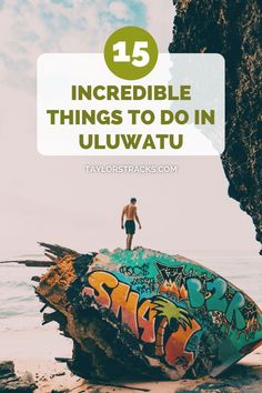 a man standing on top of a rock covered in graffiti with the words incredible things to do in uluwatu