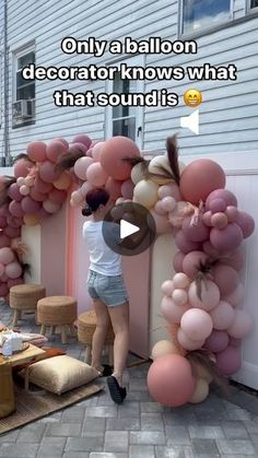 a woman standing in front of a bunch of balloons with the caption only a balloon decorator knows what that sounds like