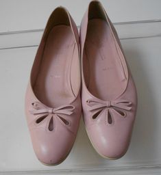 "Pink leather pumps Amalfi exclusive for Nordstrom Bow and three openings Clean and comfortable Normal wear sign but it's in great condition Dimension length 10.5\" ball of foot 3.5\" heel 1\"" Pink Slip-on Ballet Flats For Summer, Elegant Pink Slip-on Flats, Pink Low Heel Ballet Flats For Spring, Formal Pink Leather Ballet Flats, Pink Round Toe Flats For Spring, Pink Leather Ballet Flats For Formal Occasions, Pink Spring Ballet Flats, Pink Ballet Flats For Spring, Formal Pink Almond Toe Flats