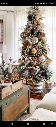 a decorated christmas tree in a living room