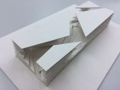 several pieces of paper stacked on top of each other