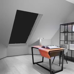 a room with a desk, chair and bookshelf in the middle of it