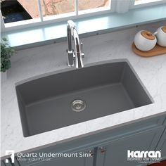 Its sweeping curved rear bowl wall gives this enormous single bowl design a stylish flair. Its quartz composite material gives it outstanding durability and will provide years of trouble-free use. This undermount design is available in a selection of 6 rich color choices to compliment any decor. Karran Sinks are a great addition to any home improvement project. Karran Undermount 32-in x 19.5-in Grey Quartz Single Bowl Kitchen Sink in Gray | QU-712-GR Vincennes Indiana, Composite Kitchen Sinks, Quartz Sink, Topmount Sink, Composite Sinks, Solid Surface Countertops, Undermount Sinks, Quartz Kitchen, Bowl Kitchen Sink