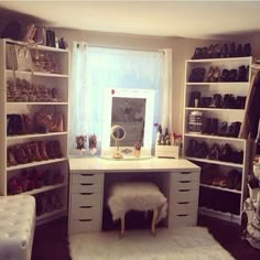 a room filled with lots of shoes and shelves