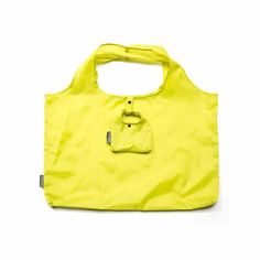 a yellow bag on a white background with the handles down and an open pocket at the bottom