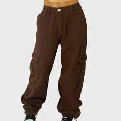 Brown Cargo Pants With A Straight Leg And Added Pockets For A Stylish And Full Functioning Pant. Brown Straight Leg Parachute Pants For Spring, Brown Straight Cargo Pants For Summer, High Waist Brown Pants With Hip Pockets, Utility Style High Waist Brown Bottoms, Brown Utility Pants For Summer, Baggy Brown Cargo Style Bottoms, Baggy Brown Cargo Pants For Summer, Brown Bottoms With Hip Pockets For Spring, Brown Baggy Cargo Style Bottoms