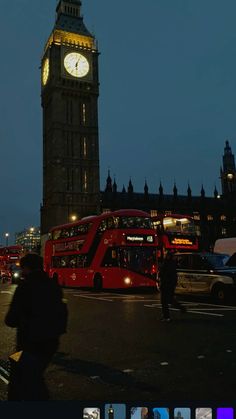 the big ben clock tower towering over the city of london, england at night time