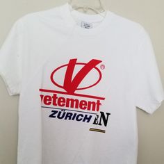 Brand New With Tags Vetements T Shirt. Never Worn! Washed Cotton T-shirt For Streetwear, Streetwear T-shirt With Funny Text In Ring-spun Cotton, Short Sleeve T-shirt With Logo Emblem For Streetwear, Vetements Shirt, American Flag Short Sleeve T-shirt For Streetwear, Clothing Brand, Colorful Shirts, Tee Shirts, Mens Shirts