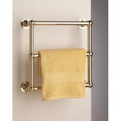 a towel rack with two towels hanging from it's sides, in a bathroom