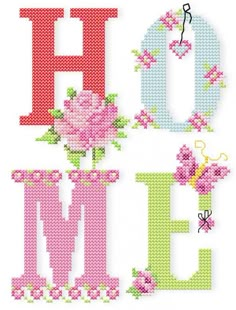 a cross stitch pattern with the word home and flowers on it's front side