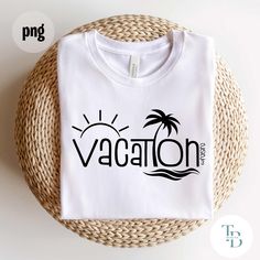 a white t - shirt with the word vacation printed on it next to a woven basket