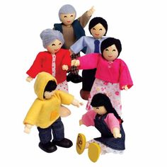 a group of dolls sitting next to each other