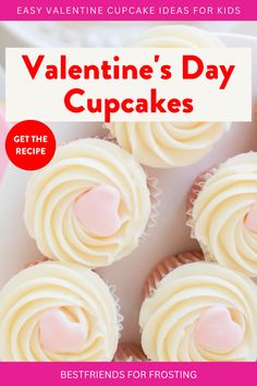 valentine's day cupcakes with white frosting and pink hearts on top