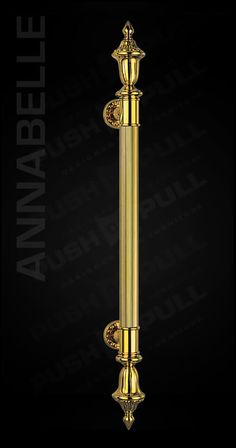 an ornate golden metal pole on a black background with the words avanabeele