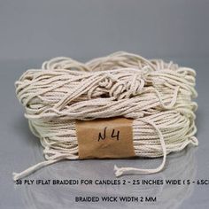 a spool of white twine with the number 4 on it and labeled no4