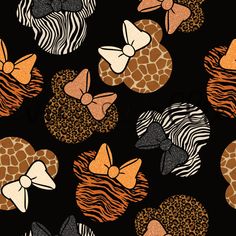 an animal print pattern with zebras, giraffes and bows on black