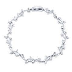 This delicate vine bracelet is plated with genuine rhodium and adorned with clear cubic zirconia. Add a feminine timeless look to your favorite evening look or make an effortless bridal statement for your big day! Base Metal: Lead Free Alloy (brass) Plating Color: Rhodium Shiny Setting Type: Prongs Stone Size: 3 Mm Stone Cut: Round Carat Weight: 1.98 (ct) Vine Bracelet, Silver Diamond Bracelet, Cubic Zirconia Bracelet, Floral Bracelet, Flower Bracelet, Brass Jewelry, Sparkling Crystal, Wedding Bracelet, Silver Diamonds