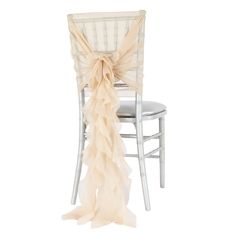 a chair with a beige ruffled sash on it