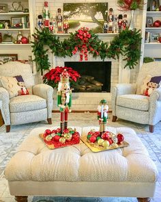 a living room filled with furniture and christmas decorations