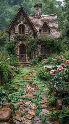 a stone house surrounded by lush greenery and pink flowers in the foreground is a garden path with stepping stones leading up to it