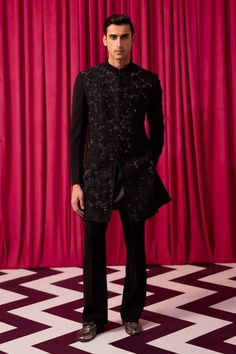 Black sherwani with cutdana embroidery in geometric pattern. Paired with kurta and pant. - Aza Fashions Eid Party Bandhgala With Chikankari Embroidery, Black Party Sherwani With Chikankari Embroidery, Designer Nehru Jacket With Chikankari Embroidery For Party, Designer Kurta For Eid Party, Black Sherwani With Chikankari Embroidery For Party, Designer Kurta With Chikankari Embroidery For Party, Black Chikankari Embroidery Sherwani For Party, Black Bandhgala With Chikankari Embroidery For Party, Fitted Sherwani With Chikankari Embroidery For Party