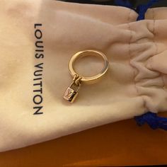 Brand New Louis Vuitton 18k Rose Gold Lock Ring Size 49 French Or 5 Us Lock Charm Solid Band 18k Rose Gold Louis Vuitton Ring, Solitaire Ring Designs, Louis Vuitton Necklace, Louis Vuitton Bracelet, Multicolor Bracelet, Louis Vuitton Multicolor, Lock Ring, Monogram Bracelet, Good Luck Bracelet