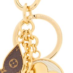 louis vuitton keychain with heart and umbrella charm in gold plated metal