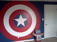 the captain's shield is painted on the wall in this child's room