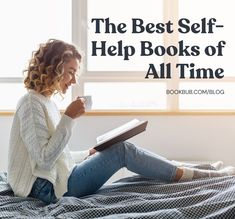 a woman is sitting on her bed reading a book and drinking coffee with the words, the best self help books of all time