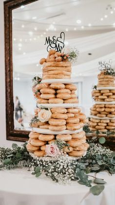 a wedding cake made out of donuts