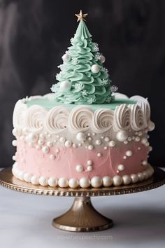 a decorated cake with a christmas tree on top